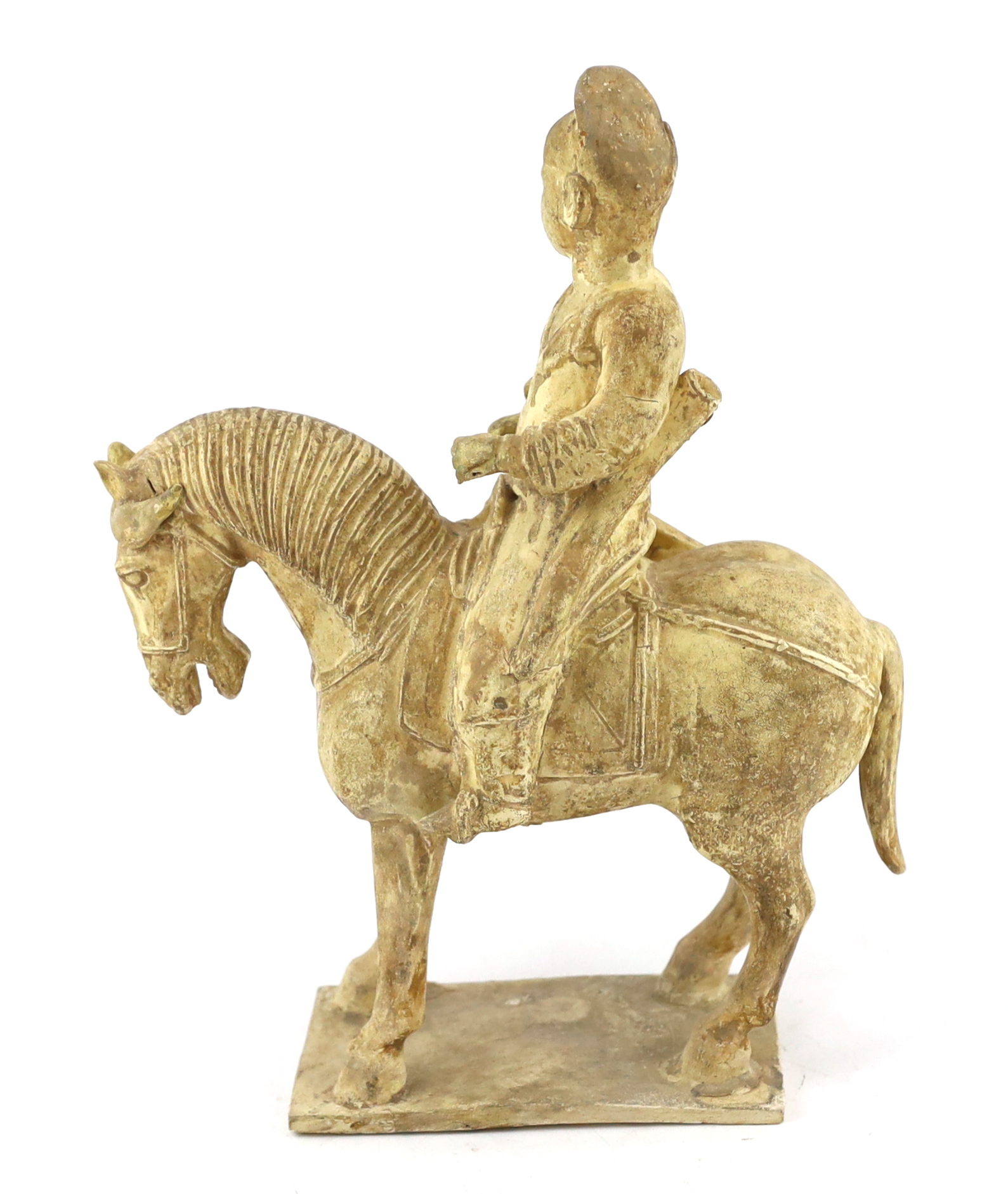 A Chinese cream glazed pottery model of an archer on horseback, Tang Dynasty (618-906 AD)